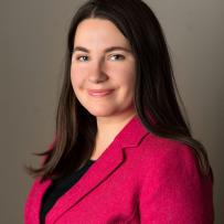 A smiling headshot of Kalista Kohlman