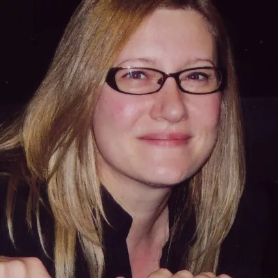 Smiling headshot of Dr. Carrie Dennett