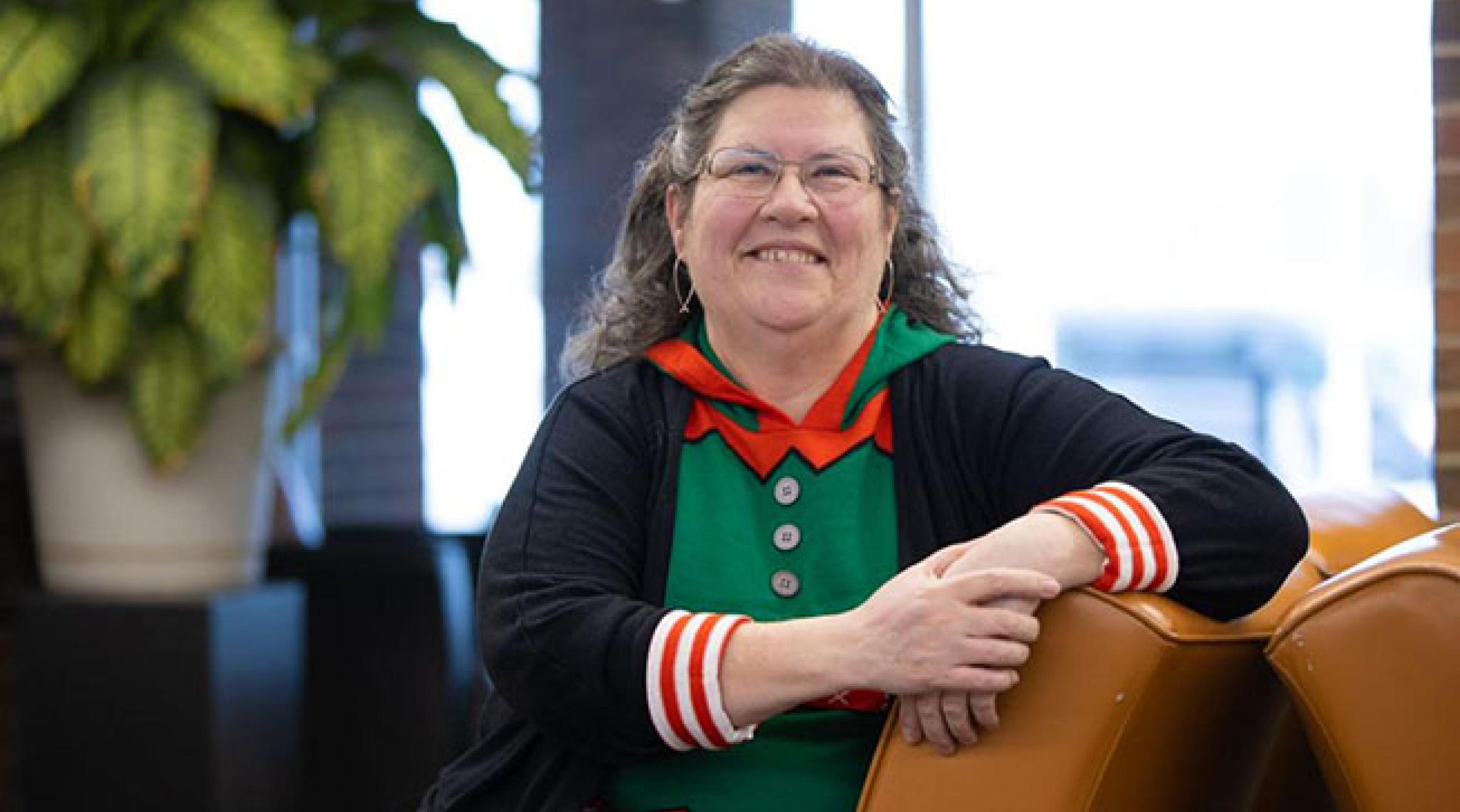 Lynne Madsen helps students