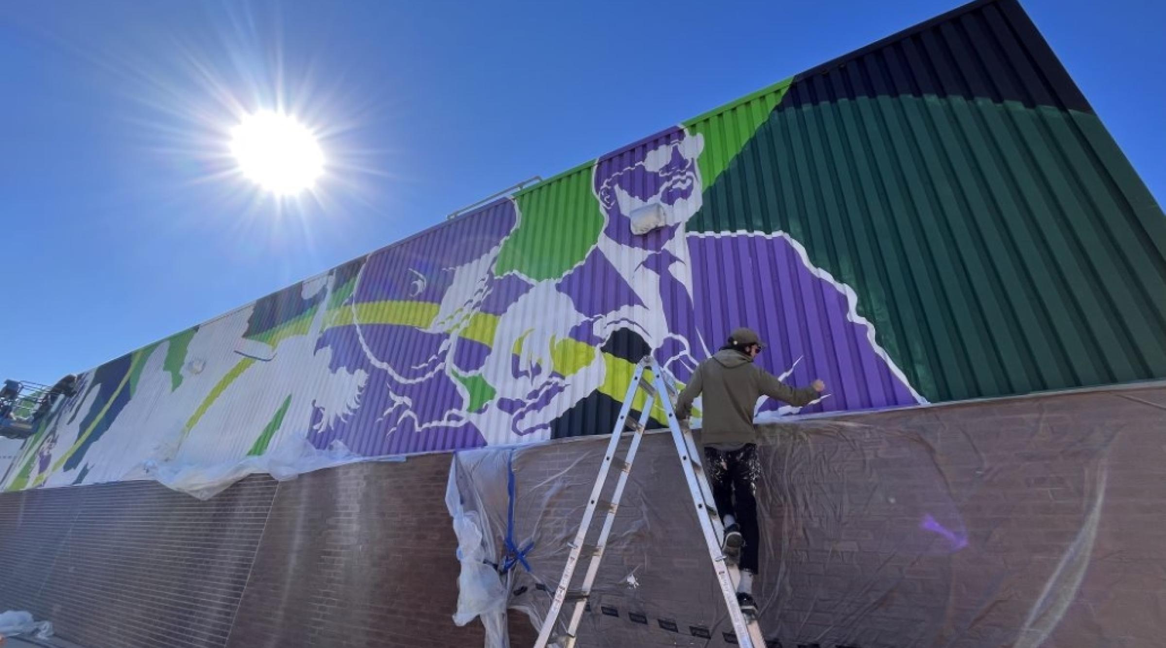 Welikolad Event Centre mural painted by alum Kat Simmers