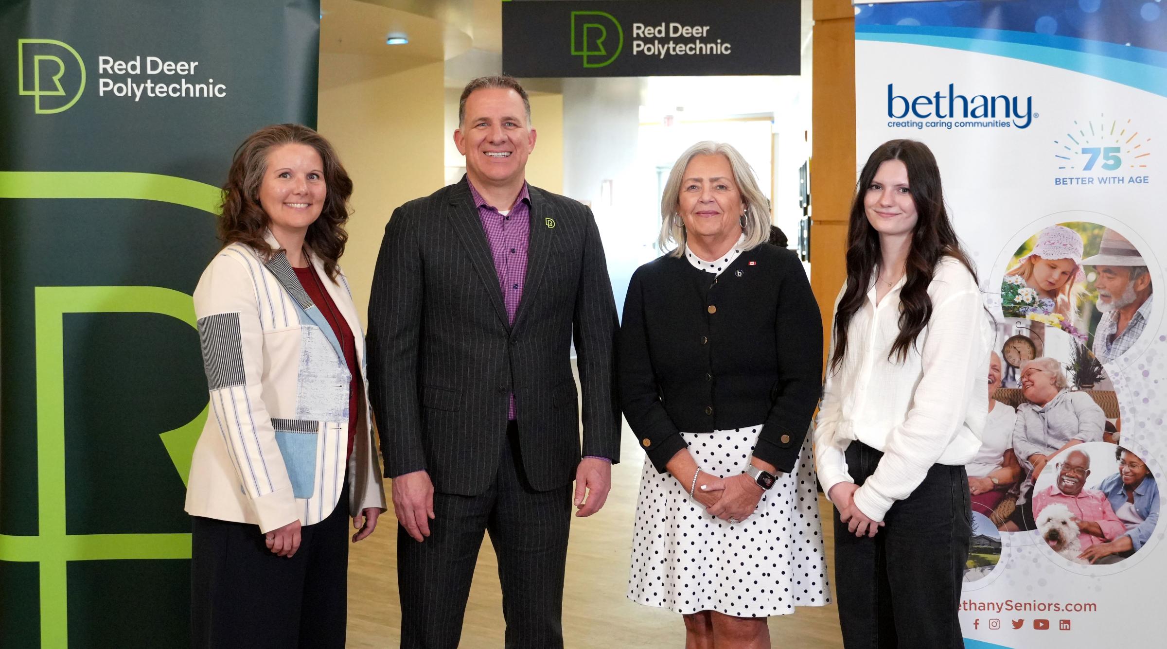 Dr. Tonya Wolfe, Stuart Cullum, Jennifer McCue, and Brooke Schwartz at the MOU resigning