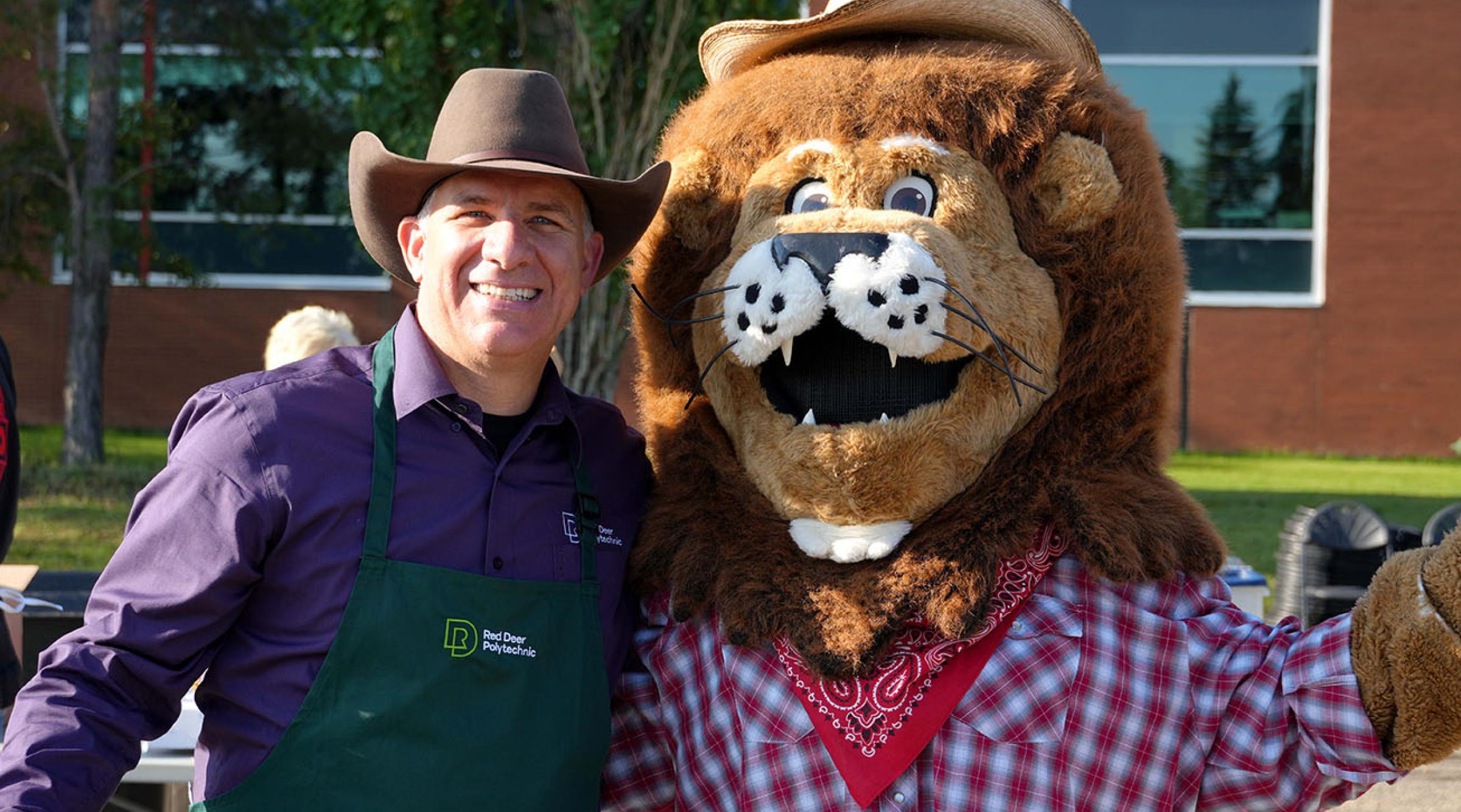 Stuart Cullum, RDP President, and Rufus, RDP mascot, at RDP's Westerner Days Pancake Breakfast on July 18, 2025
