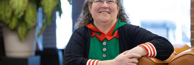 Lynne Madsen helps students