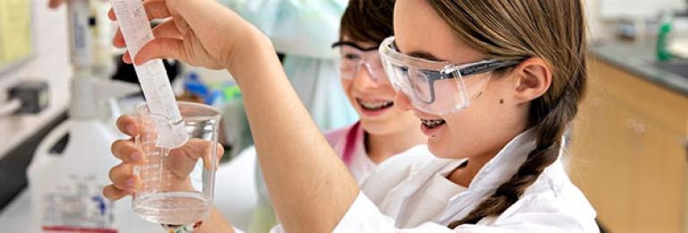 Kids performing science experience at RDP day camps