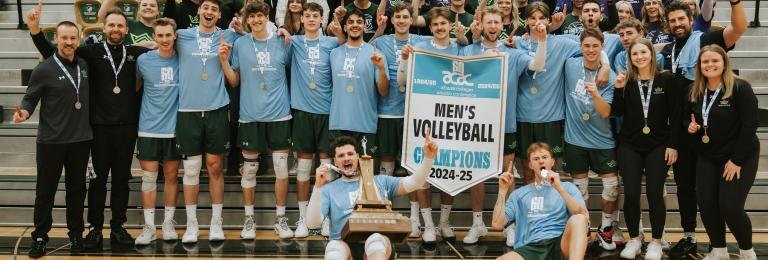 A group shot of the RDP Kings volleyball team with their ACAC gold medals